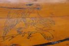 eagle drawing on log table